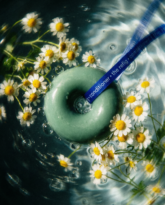 Blue Tansy Conditioner Bar editorial shot with chamomile
